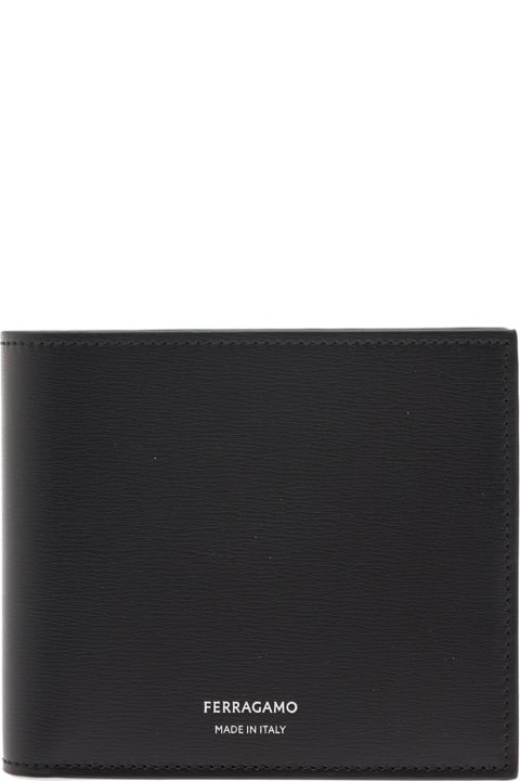 メンズ新着アイテム Ferragamo Black Bifold Wallet With Logo Lettering In Leather Man