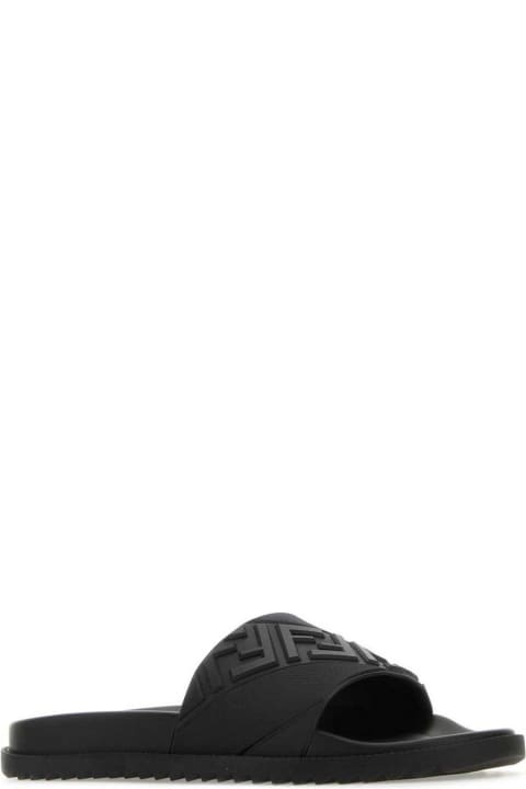 メンズ Fendiのシューズ Fendi Logo Embossed Slip-on Slippers