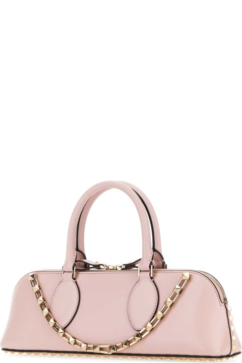 Valentino Garavani Bags for Women Valentino Garavani Pastel Pink Leather Rockstud East-west Handbag