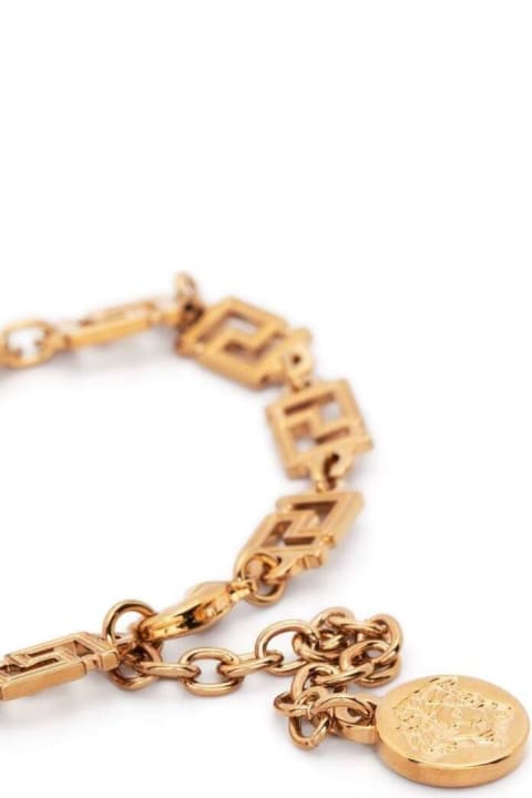 Greca Bracelet With Medusa Charm In Gold-tone Brass Man