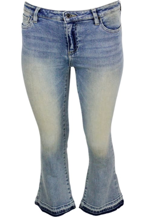 Armani Collezioni Pants & Shorts for Women Armani Collezioni Stretch Jeans In Vintage Effect Denim Flare Capri Model With Fringed Trumpet Bottom.