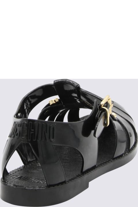 Moschino Other Shoes for Men Moschino Black Rubber Sandals