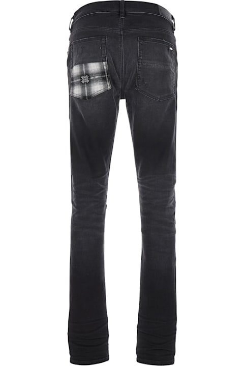 AMIRI for Men AMIRI 'ma Quad Plais Mx1' Black Jeans With Ripped Details On The Front And Decorative Patches In Denim Man