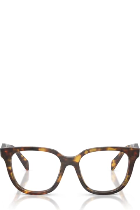 Prada Eyewear Kids Prada Eyewear Prada Pr C11v 14l1o1 Miele Tartarugato Glasses
