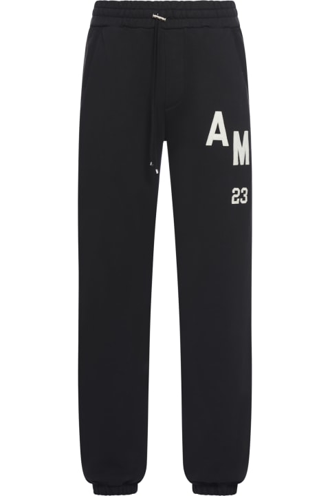 Amiri Paint-drip Logo Drawstring Pants in Black for Men