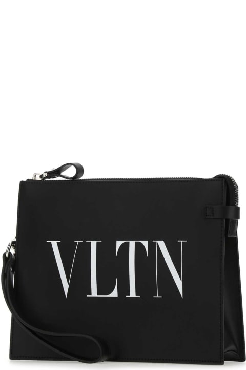 Bags for Men Valentino Garavani Black Leather Vltn Clutch