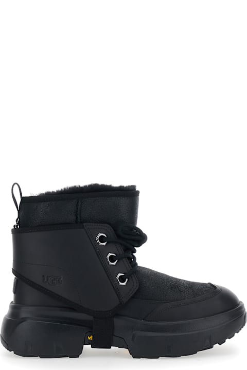 UGG for Kids UGG Black Ankle Boots With Side Logo And Platform Sole In Leather Blend Woman