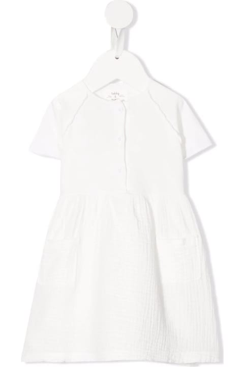 Baby Dress In White Embossed Gauze
