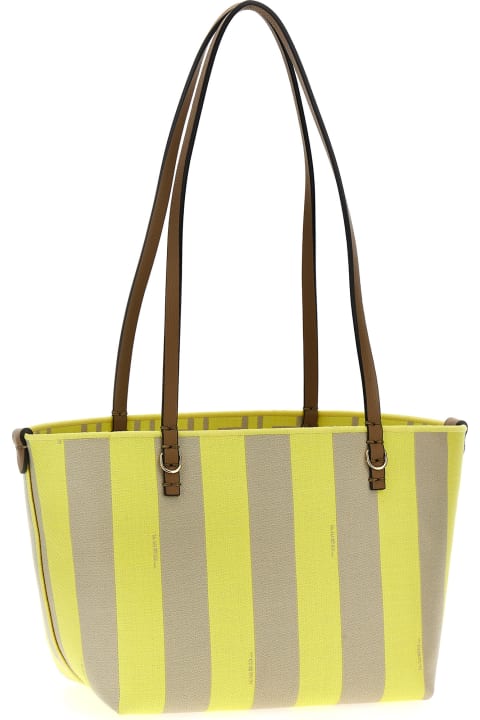 トートバッグ FENDI EMBROIDERED DENIM SMALL ROLL REVERSIBLE SHOPPING BAG Fendi Mini roll shopping bag | The Fashion Square