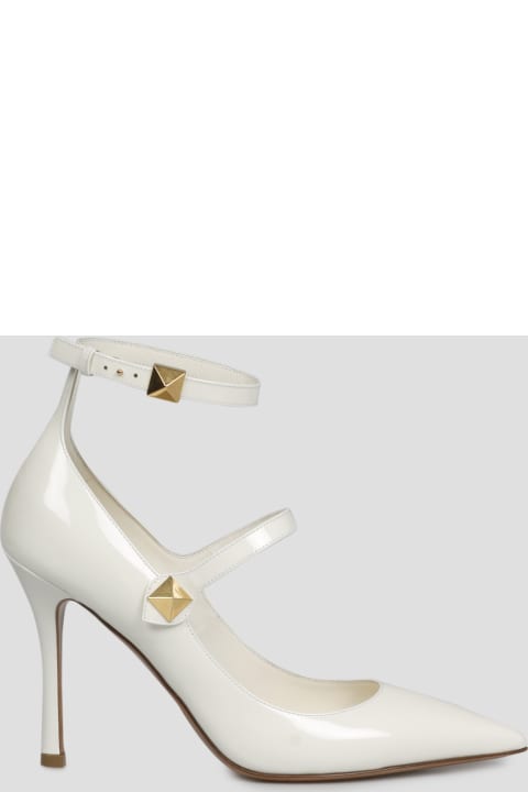 One Stud Ankle Strap Pumps