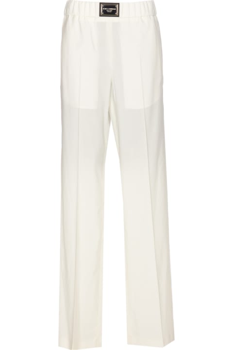 Fashion for Women Dolce & Gabbana Flare Trousers With Logo Plaque
