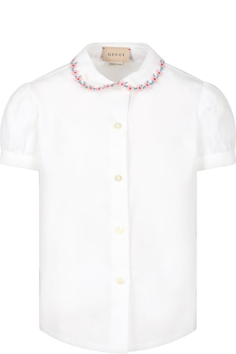White Shirt For Girl With Embroidered Flowers And Logo