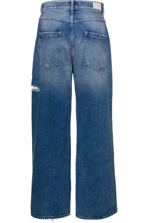 Light Blue High-waisted Jeans With Rips In Organic Cotton Denim Woman
