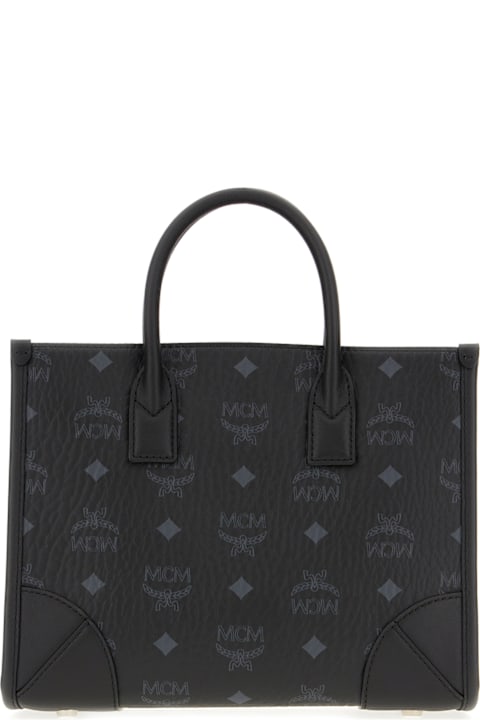 MCM Totes for Women MCM Printed Synthetic Leather Small Munchen Handbag