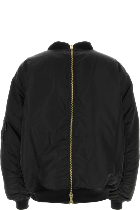 Coats & Jackets for Men VETEMENTS Black Nylon Reversible Padded Jacket