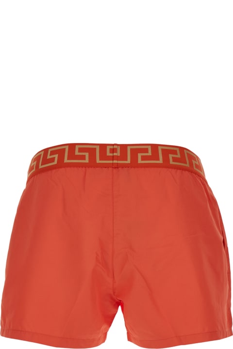 Versace for Men Versace Orange Swimsuit Shorts With Greca Detail In Tech Fabric Man