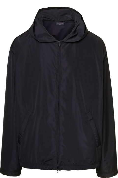 Black Hooded Windbreaker With Contrasting Logo Print At The Back In Polyester Blend Man