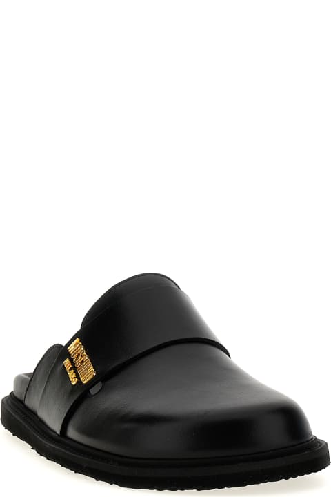 Other Shoes for Men Moschino Logo Sabots