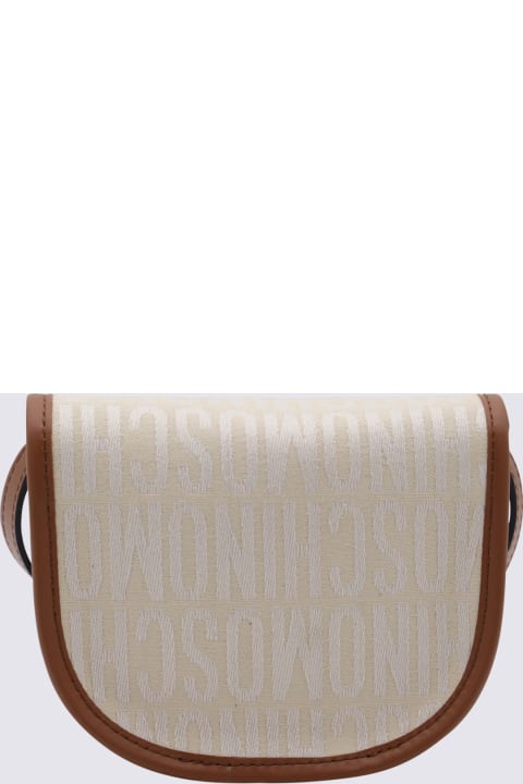 Moschino Totes for Women Moschino Ivory Canvas And Leather Allover Crossbody Bag