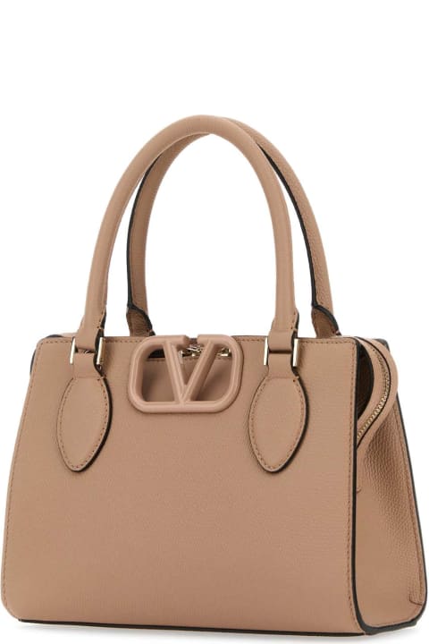 Valentino Garavani Bags for Women Valentino Garavani Antiqued Pink Leather Vlogo Handbag