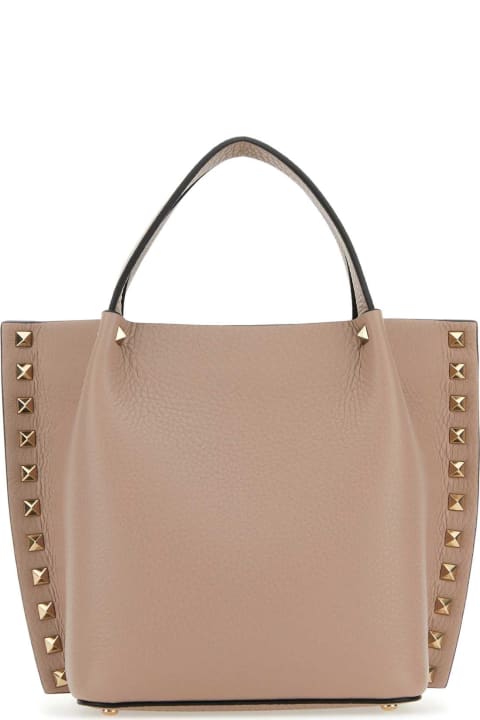 Valentino Garavani Bags for Women Valentino Garavani Antiqued Pink Leather Rockstud Handbag