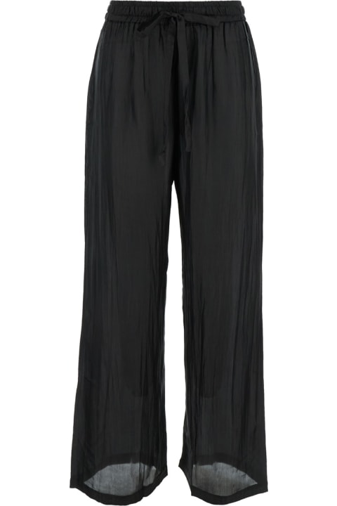 The Rose Ibiza Pants & Shorts for Women The Rose Ibiza Black Palazzo Pants With Drawstring In Silk Woman