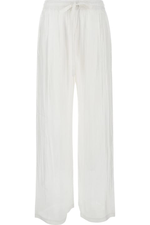 The Rose Ibiza Pants & Shorts for Women The Rose Ibiza White Palazzo Pants With Drawstring In Silk Woman
