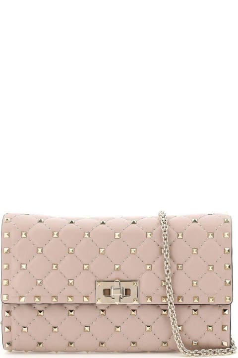 Valentino Garavani Bags for Women Valentino Garavani Antiqued Pink Nappa Leather Rockstud Spike Clutch