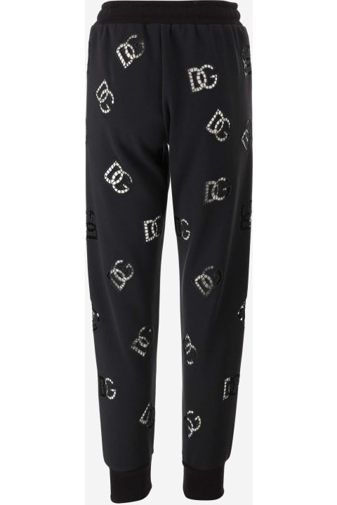 Fleeces & Tracksuits for Women Dolce & Gabbana Cotton Blend Jersey Pants With Cut Out Embroidery Dg