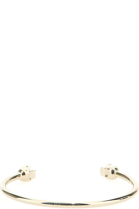 ウィメンズ Alexander McQueenのジュエリー Alexander McQueen Twin Skull Brass Bracelet