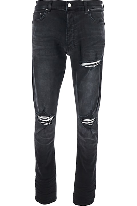 AMIRI for Men AMIRI Black Jeans With Ripped Details On The Front And Logo Patch On The Rear In Denim Man