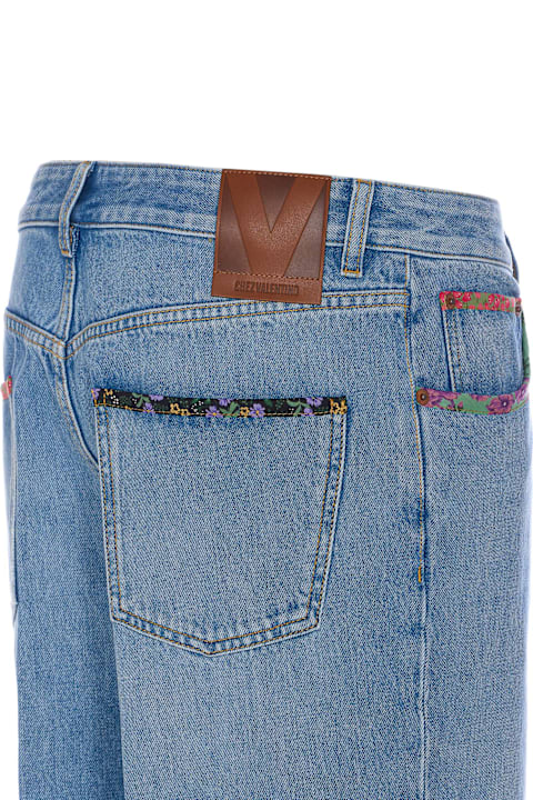 Valentino Garavani for Men Valentino Garavani Floral Print Hem Denim Trousers