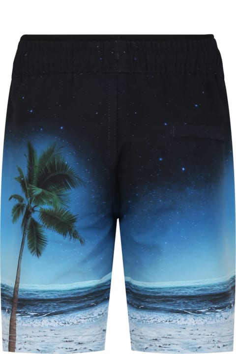 ボーイズ Moloの水着 Molo Black Swim Shorts For Boy With Surfboard Print