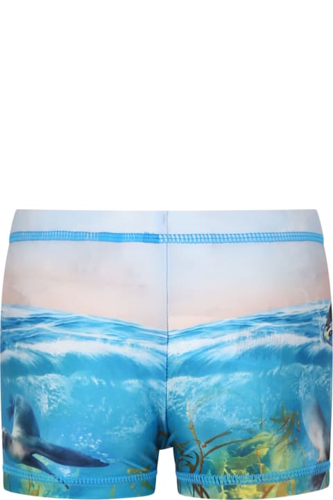 Swimwear for Boys Molo Light Blue Swim Shorts For Boy With Seal Print