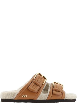 VALENTINO GARAVANI ◆ Fussfriend Shearling Sandals Fussfriend shearling-lined leather sandals in brown