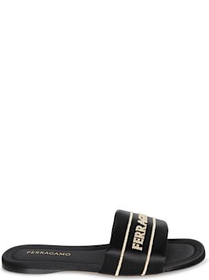 【送料&関税込】Ferragamo Black Fabric Slide Sandals Ferragamo Black Fabric Slide Sandals | italist