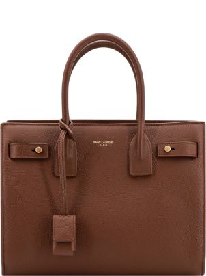 New Saint Laurent Wristlet Clutch | Designer handbags sale, Saint laurent  wallet on chain, Saint laurent wallet
