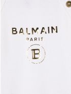 Newborn White Romper With Cap And Golden Logo Balmain Newborn White Romper With Cap And Golden Logo