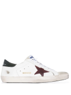 Man White Super-star Sneakers With Red Star And Black Spoiler Golden Goose Man White Super-star Sneakers With Red Star And Black Spoiler