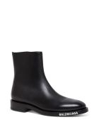 Balenciaga Leather Booties With Contrasting Logo Balenciaga Leather Booties With Contrasting Logo - Black