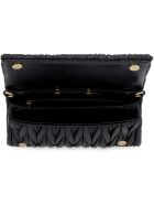 Miu Miu Quilted Leather Clutch Miu Miu Quilted Leather Clutch - black