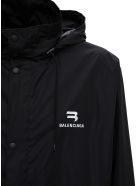Balenciaga Long Nylon Raincoat With Logo Print Balenciaga Long Nylon Raincoat With Logo Print - Black