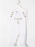 Newborn White Romper With Cap And Golden Logo Balmain Newborn White Romper With Cap And Golden Logo