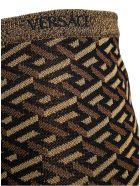Versace Viscose Blend Flared Pants With Monogram Print Versace Viscose Blend Flared Pants With Monogram Print - Metallic