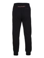 Man Black Slim Fit Joggers With Contrast Logoed Selvedge Tapes Alexander McQueen Man Black Slim Fit Joggers With Contrast Logoed Selvedge Tapes - Black