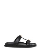 Valentino Garavani Roman Stud Slide Sandals In Black Leather Valentino Garavani Roman Stud Slide Sandals In Black Leather - Black