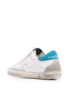 Woman White Super-star Sneakers With Peach Pink Laces, Black Star And Spoiler In Light Blue Fabric Golden Goose Woman White Super-star Sneakers With Peach Pink Laces, Black Star And Spoiler In Light Blue Fabric