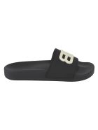 Balenciaga Embossed Logo Pool Sliders Balenciaga Embossed Logo Pool Sliders - Black/Glow