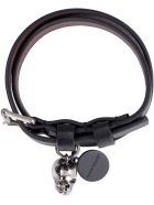 Alexander McQueen Leather Bracelet With Metal Logo Pendant And Skull Alexander McQueen Leather Bracelet With Metal Logo Pendant And Skull - black