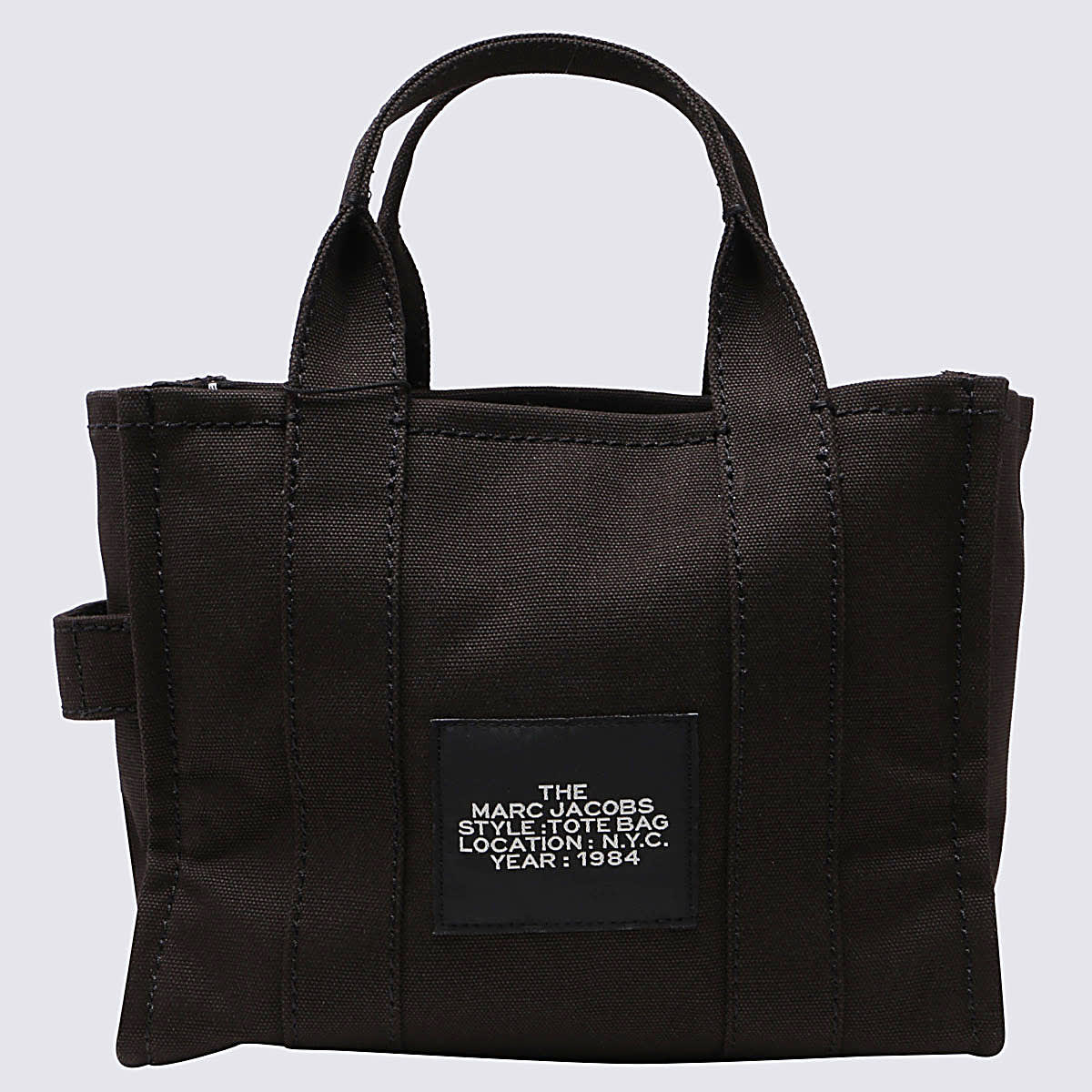 トートバッグ MARC JACOBS BLACK CANVAS THE SMALL TRAVELER TOTE BAG Amazon.com: Marc Jacobs Women's The Canvas Small Tote Bag